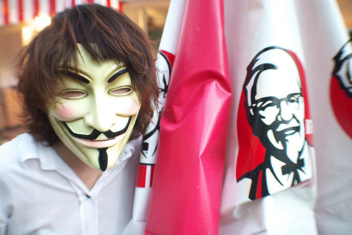 Anarchist demonstrator in Guy Fawkes mask.
