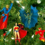 Superman, Batman, Wonder Woman and Flash guard a Christmas tree.