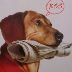 Dog delivering a newspaper.